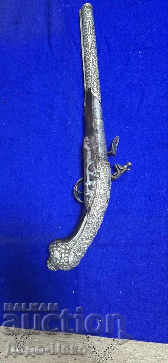 Delivery of Silver Flintlock Pistol