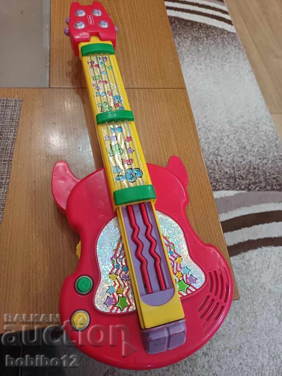 Delivery of Fisher Price 2-in-1 Bach 'n Rock Guitar/Violin