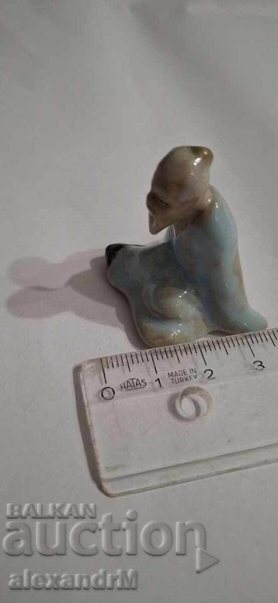 Auction Chinese ceramic figurine, "mudman" type Auction Chinese ceramic figurine, "mudman" type