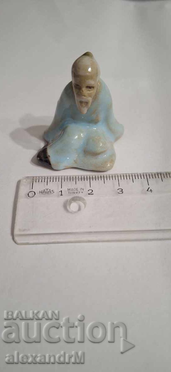 Chinese ceramic figurine, "mudman" type Chinese ceramic figurine, "mudman" type