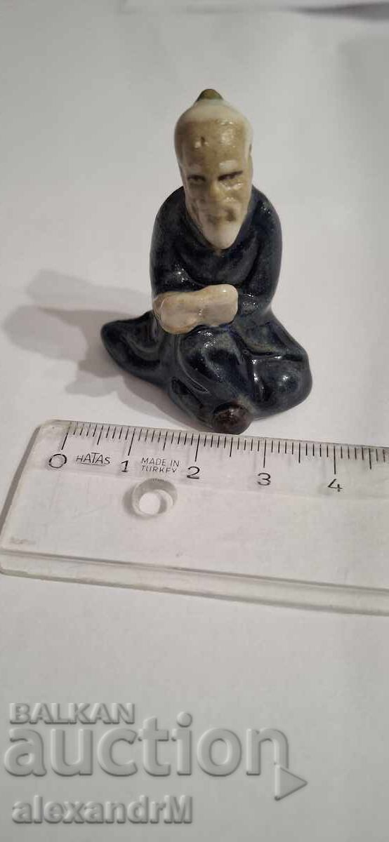 Chinese ceramic figurine, "mudman" type Chinese ceramic figurine, "mudman" type