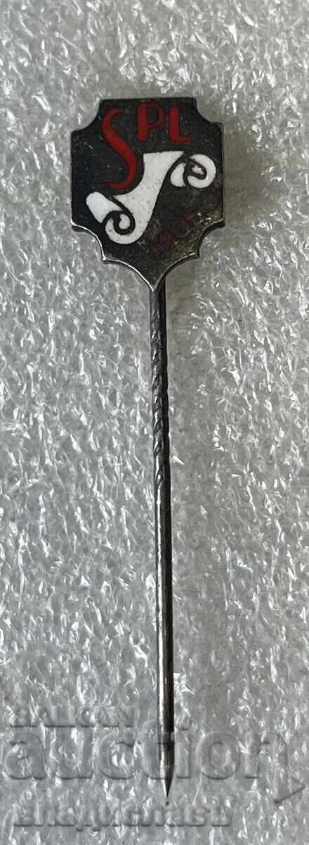 Old SPL badge with marking on the back