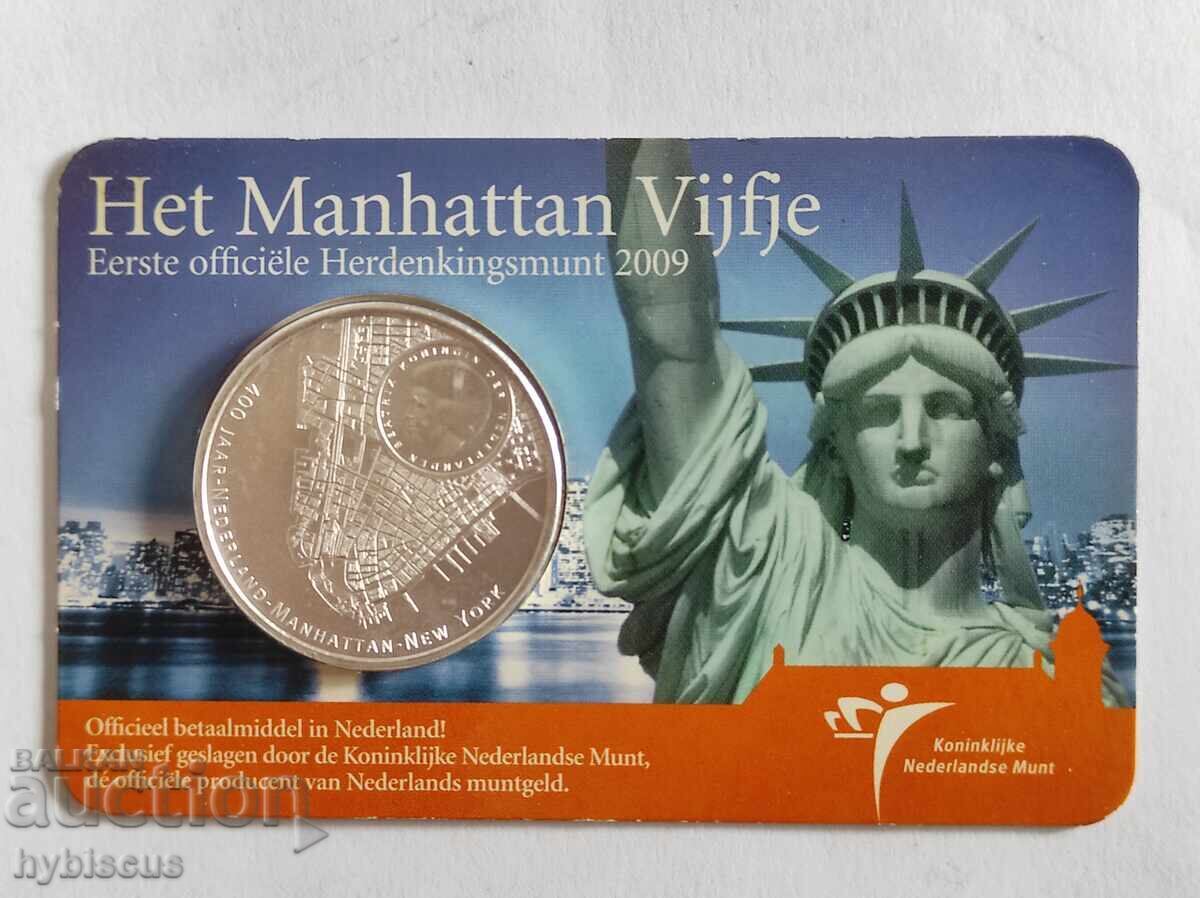 Възпоменателна монета от пет евро, Манхатън, от Холандия. с цена € 10.00 | 19.56 лв. Възпоменателна монета от пет евро, Манхатън, от Холандия. с цена € 10.00 | 19.56 лв.