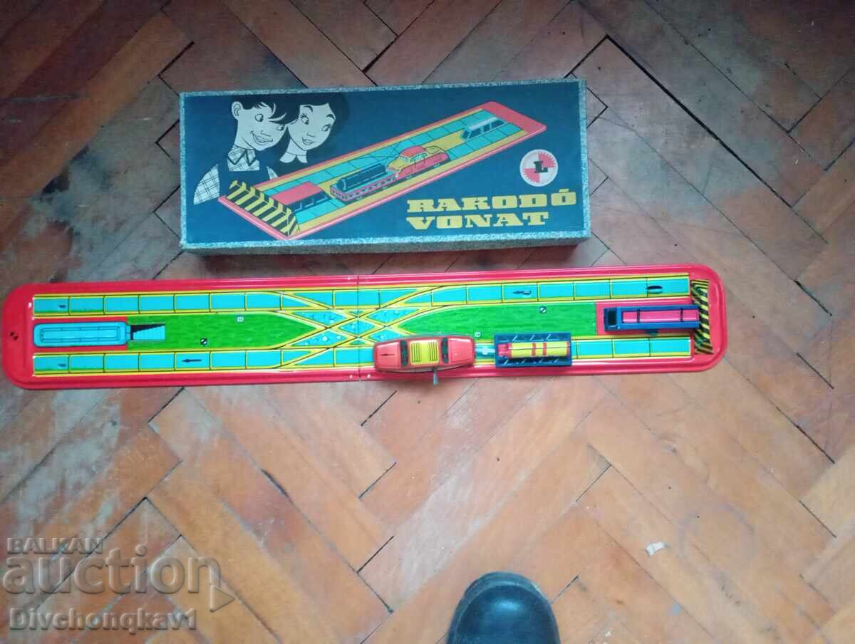 Jucărie mecanică metalică Jucărie mecanică metalică