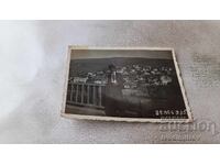 Fotografie Veles Bărbat deasupra orașului