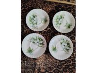 Four Royal Albert coffee saucers