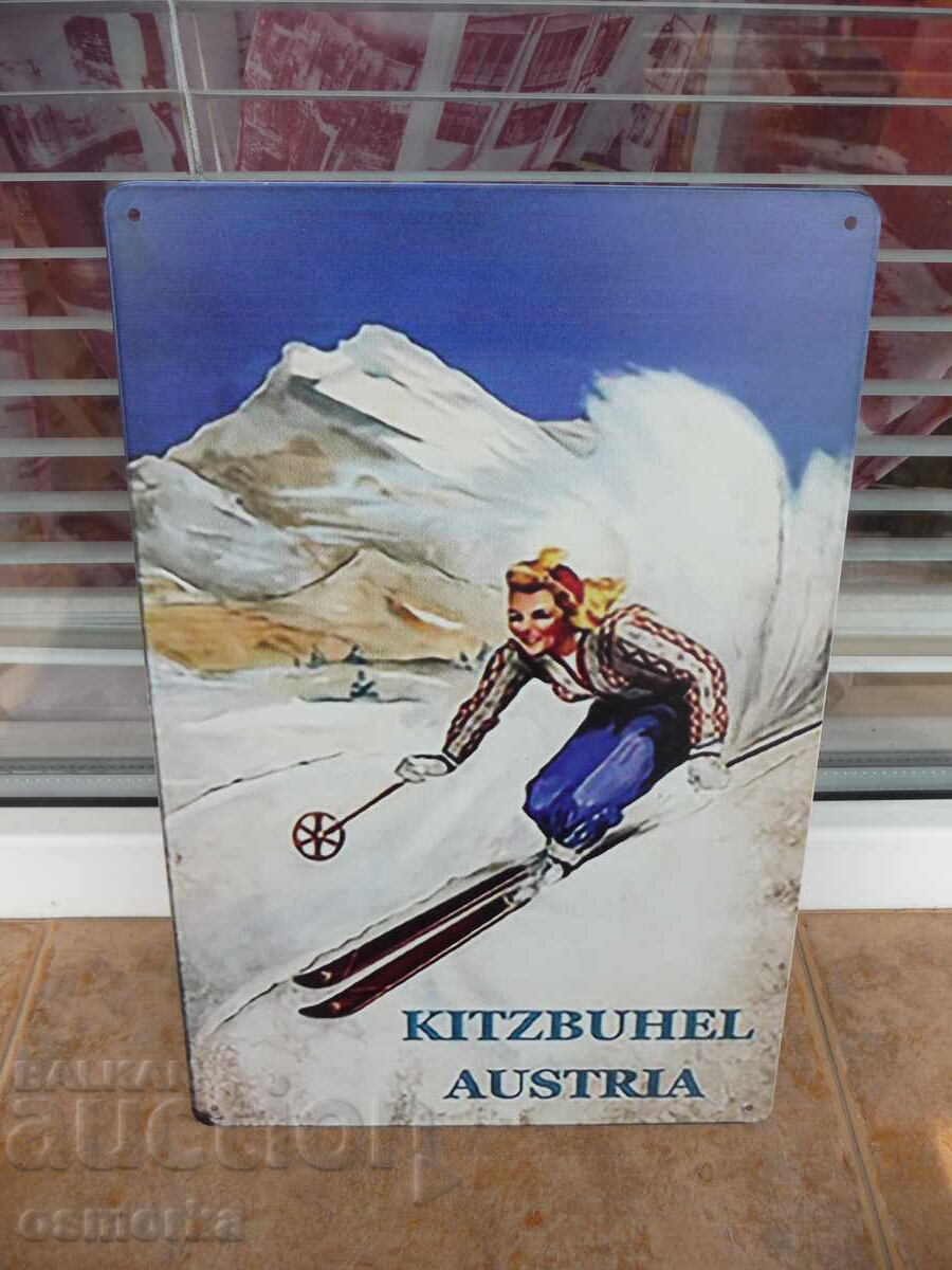 Metal sign various skis Kitzbühel Austria center winter resort Metal sign various skis Kitzbühel Austria center winter resort