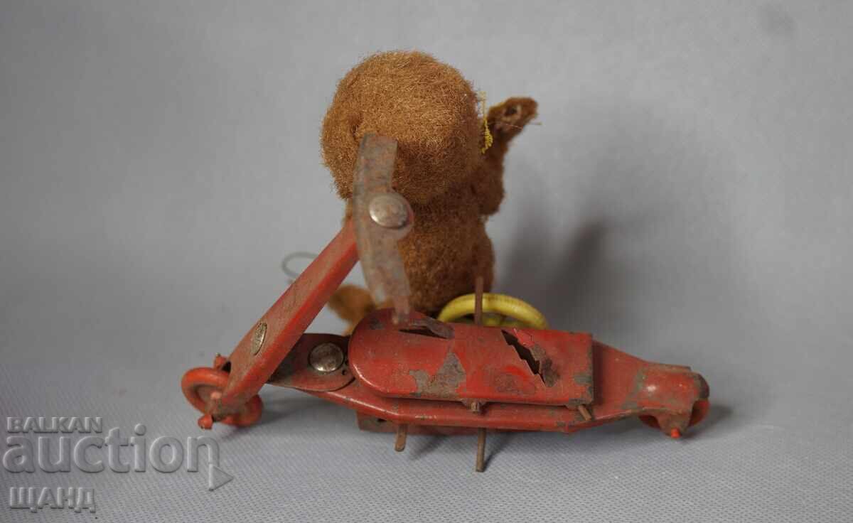 Παλιό μηχανικό μεταλλικό παιχνίδι, μοντέλο σκούτερ με μαϊμού με τιμή 12.35 BGN | € 6.31 Παλιό μηχανικό μεταλλικό παιχνίδι, μοντέλο σκούτερ με μαϊμού με τιμή 12.35 BGN | € 6.31