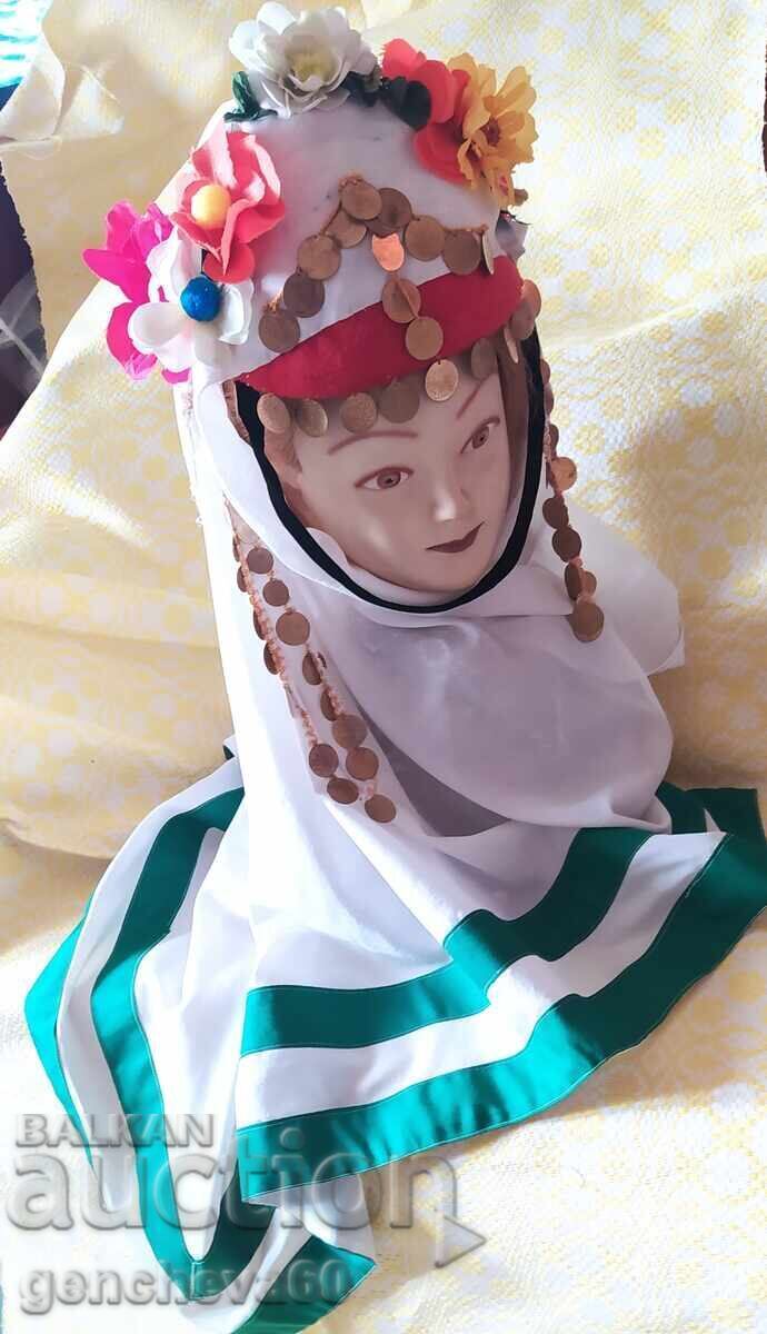 Ethnic Lazar's sickle, headscarf, flowers, and pendants