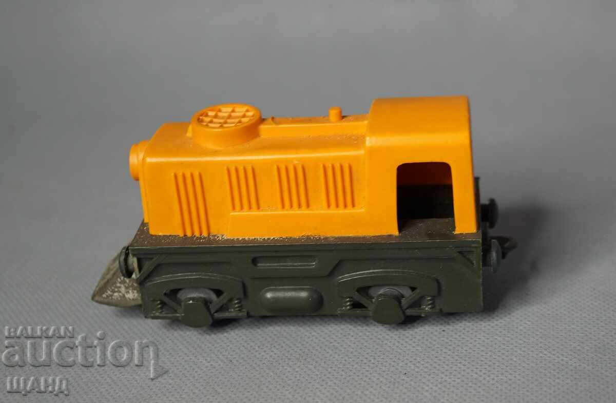 Δημοπρασία Παλιό πλαστικό μηχανικό παιχνίδι τρένο ατμομηχανή