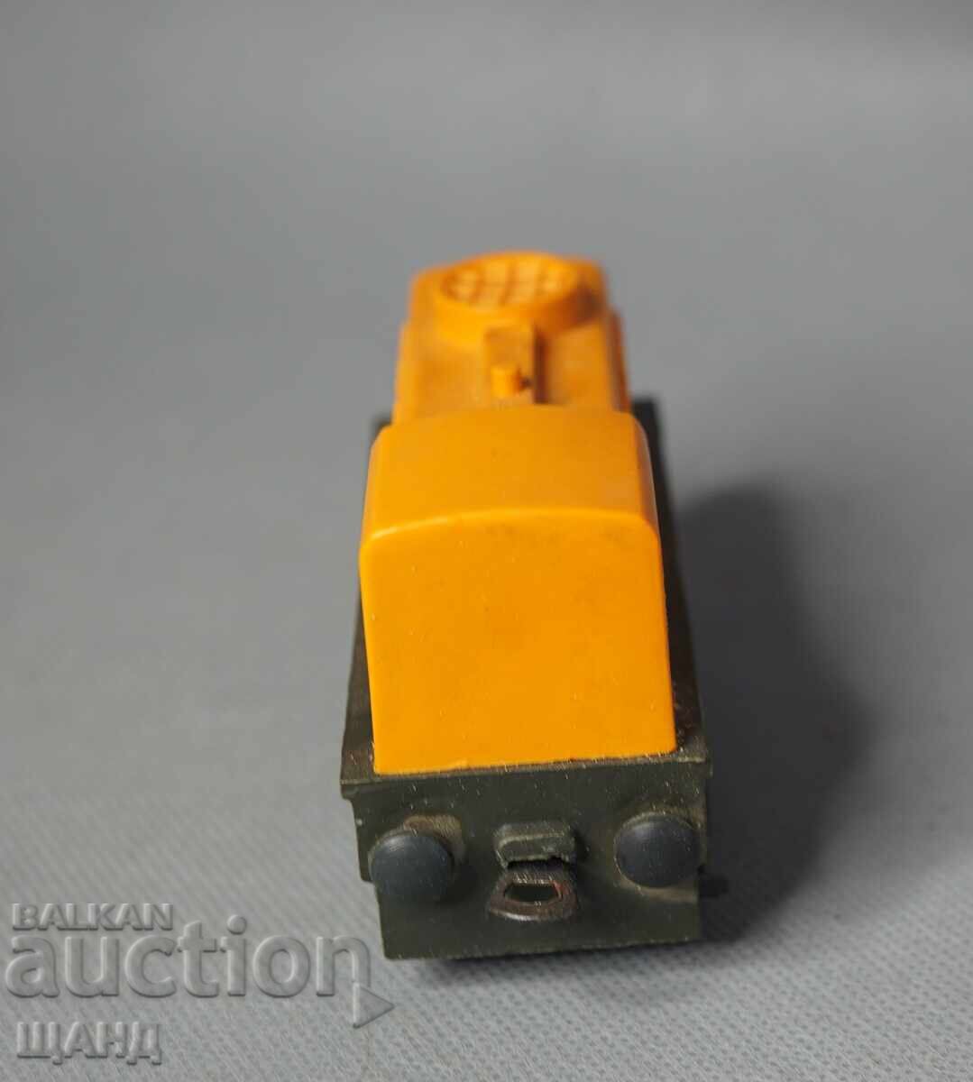 Παράδοση Παλιό πλαστικό μηχανικό παιχνίδι τρένο ατμομηχανή