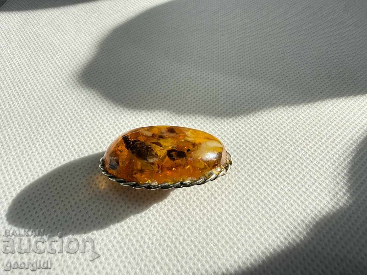 Delivery of Old amber brooch. No. 7740 Delivery of Old amber brooch. No. 7740