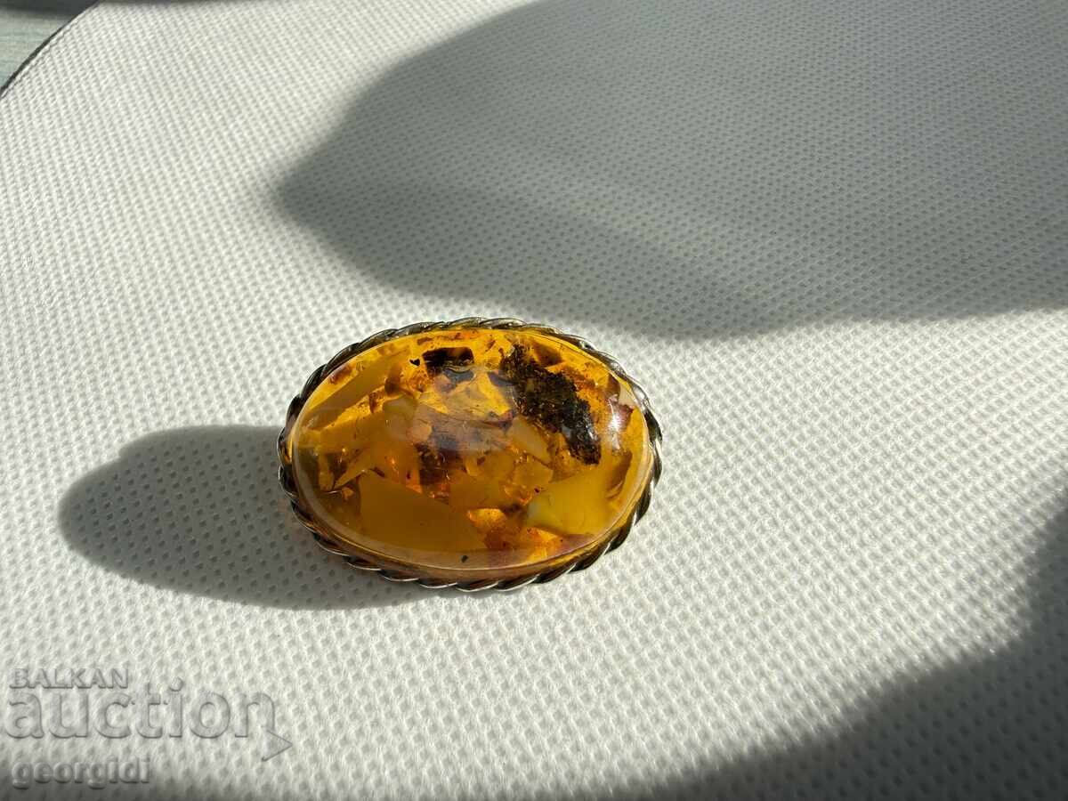 Old amber brooch. No. 7740 Old amber brooch. No. 7740