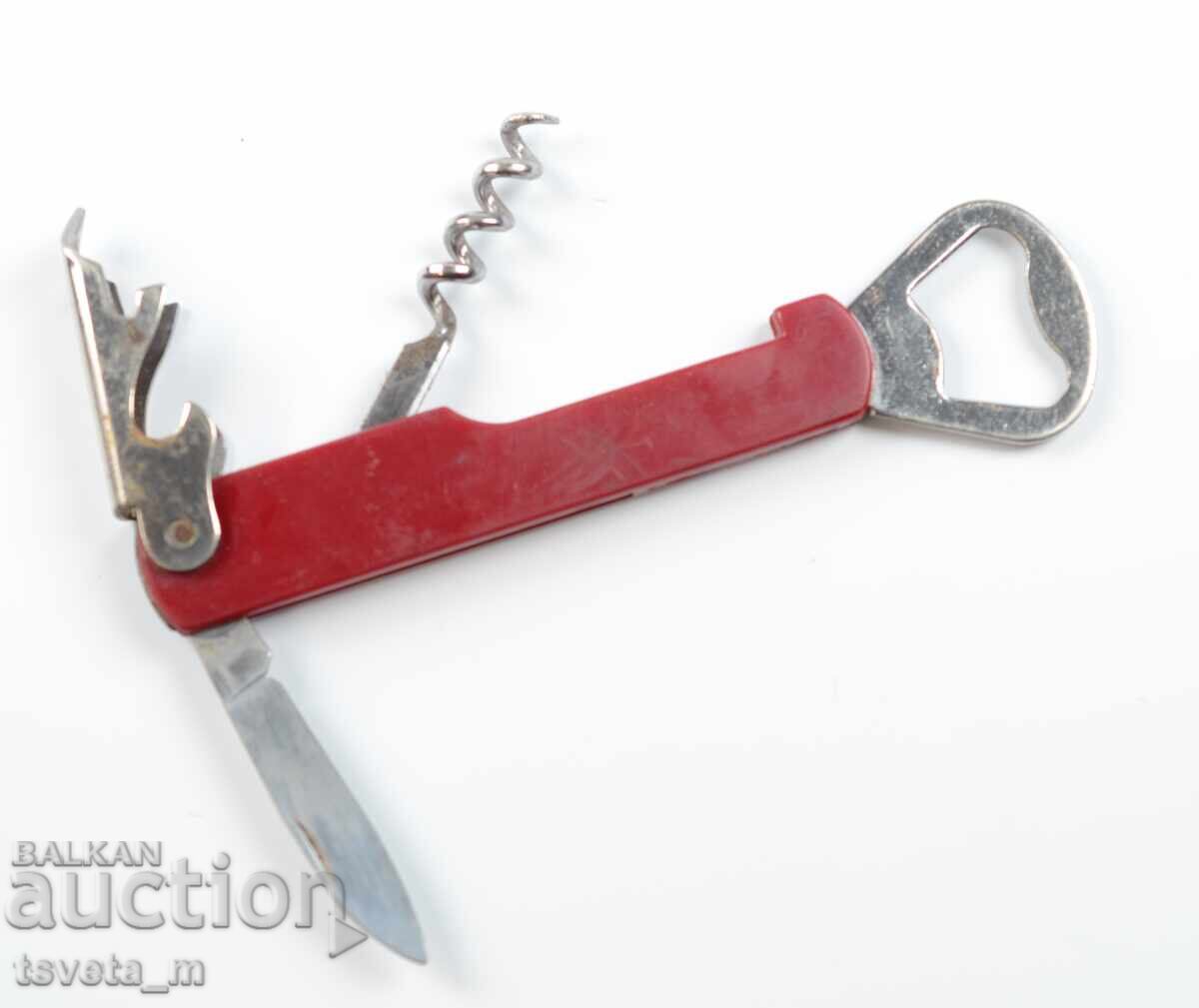 Auction Corkscrew and blade opener Auction Corkscrew and blade opener