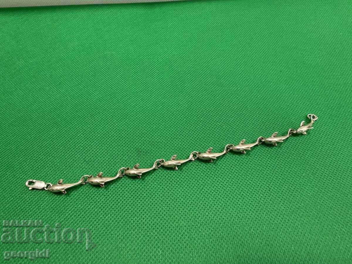 Дизайнерска сребърна гривна с делфини. №7764 с цена € 58.80 | 115.00 лв. Дизайнерска сребърна гривна с делфини. №7764 с цена € 58.80 | 115.00 лв.