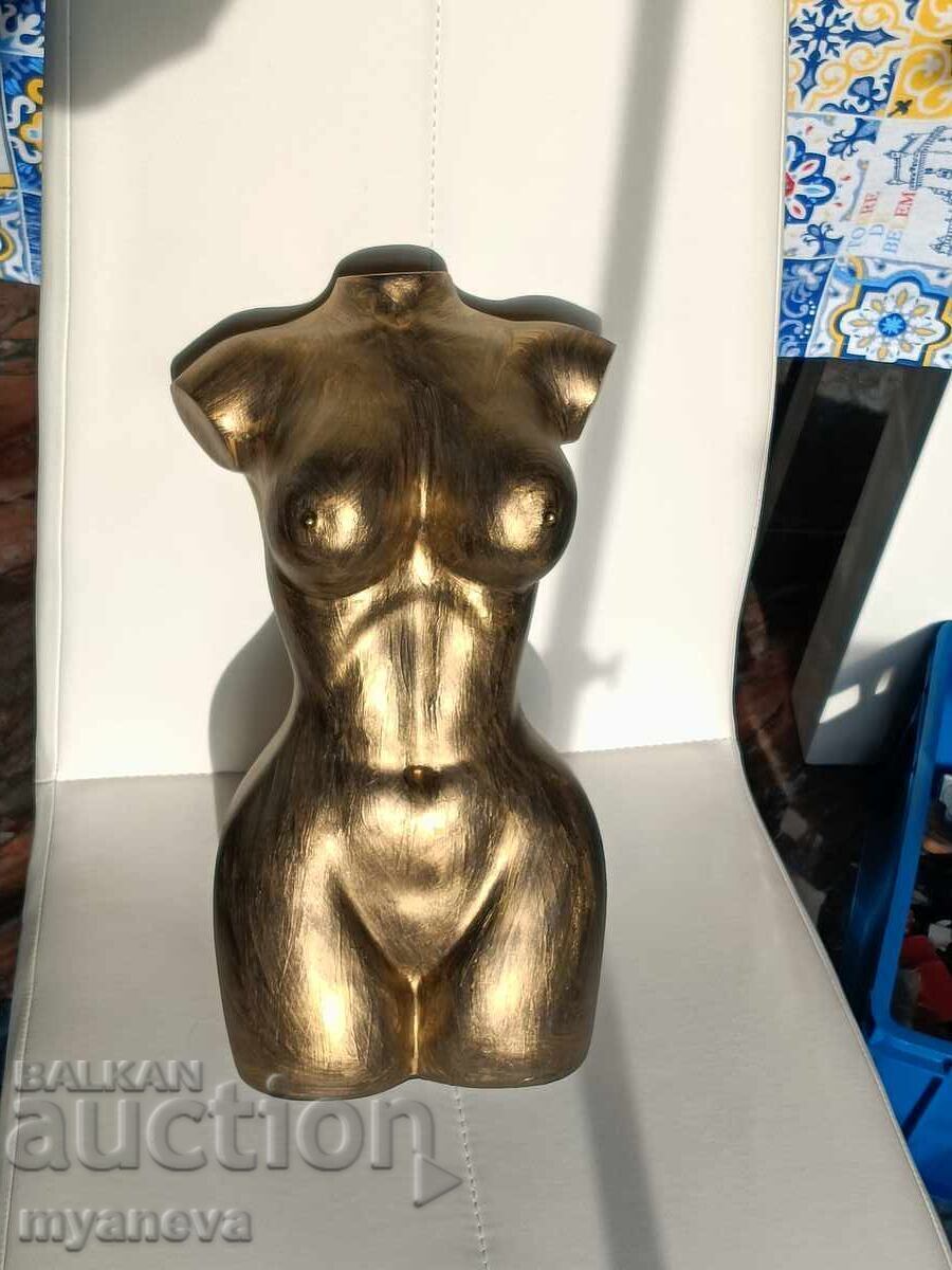 Delivery of Sculpture of a female torso in an elegant golden color