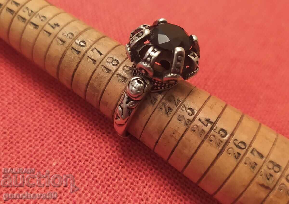 Auction  Old silver ring with a stone
