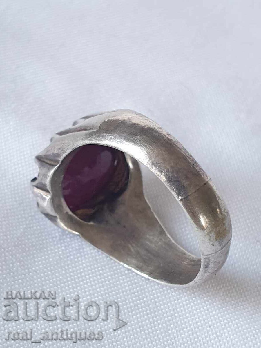 Auction  Silver ring with a ruby