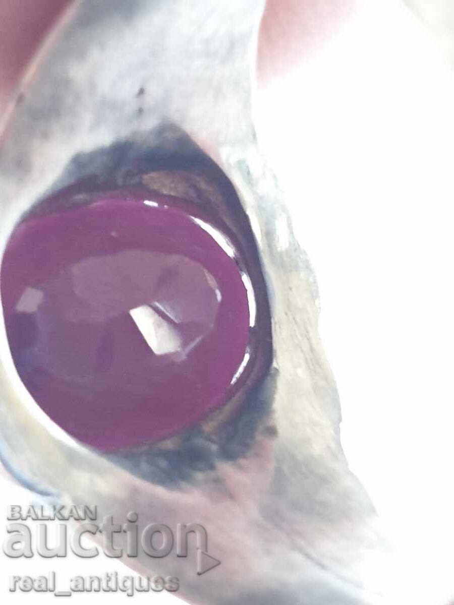 Delivery of Silver ring with a ruby