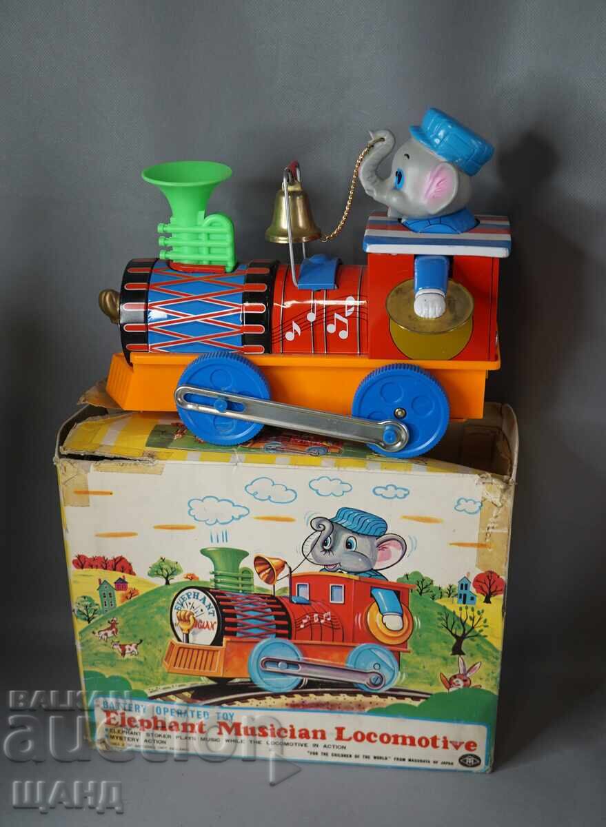 Vechi trenuleț locomotivă japonez de jucărie muzicală cu Elefant