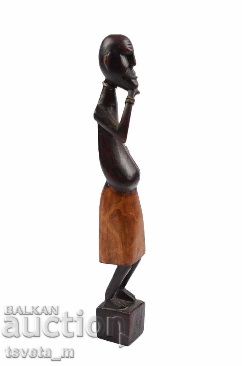 Auction  Handmade African wooden figurine