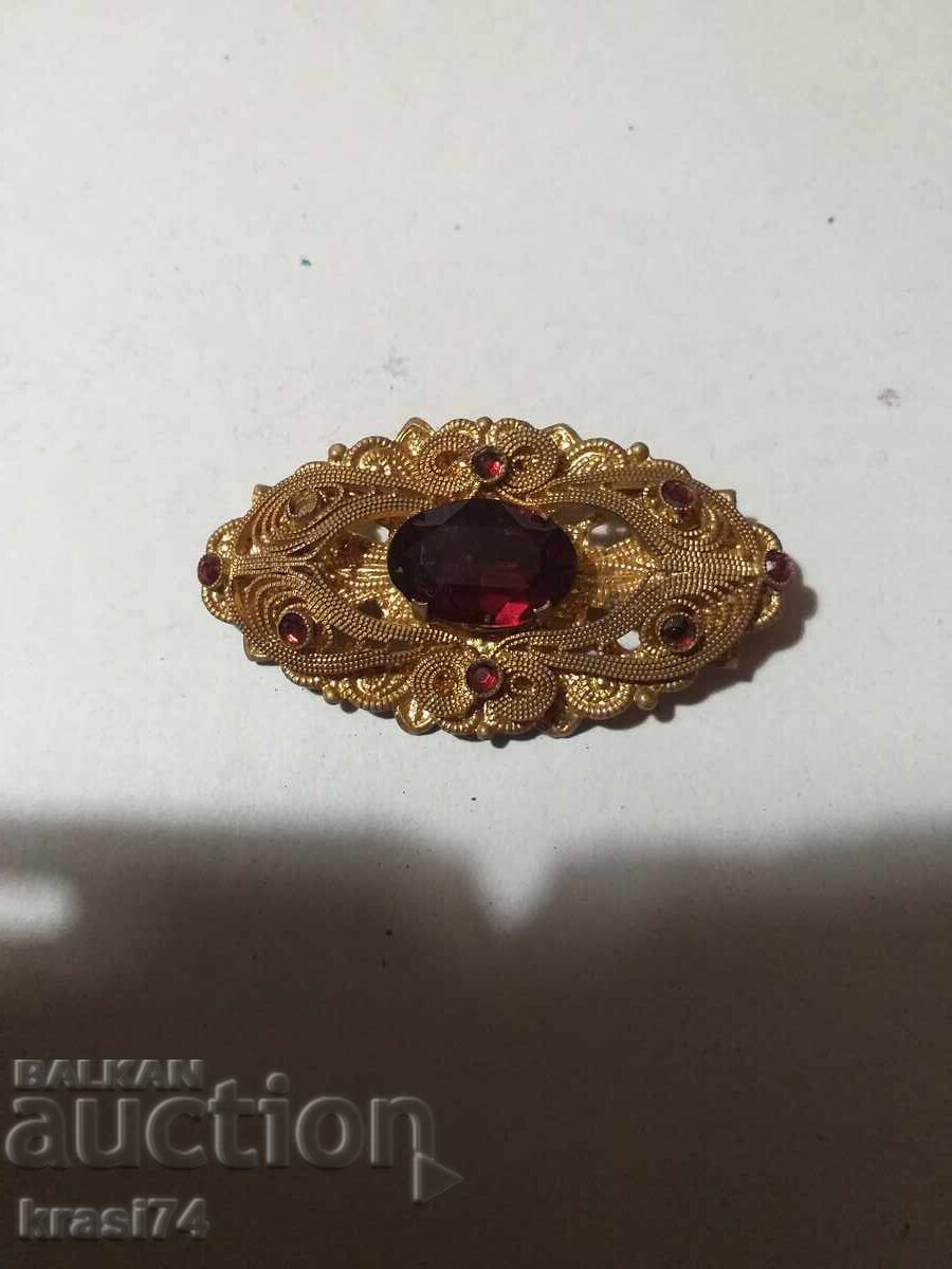 Gilded brooch