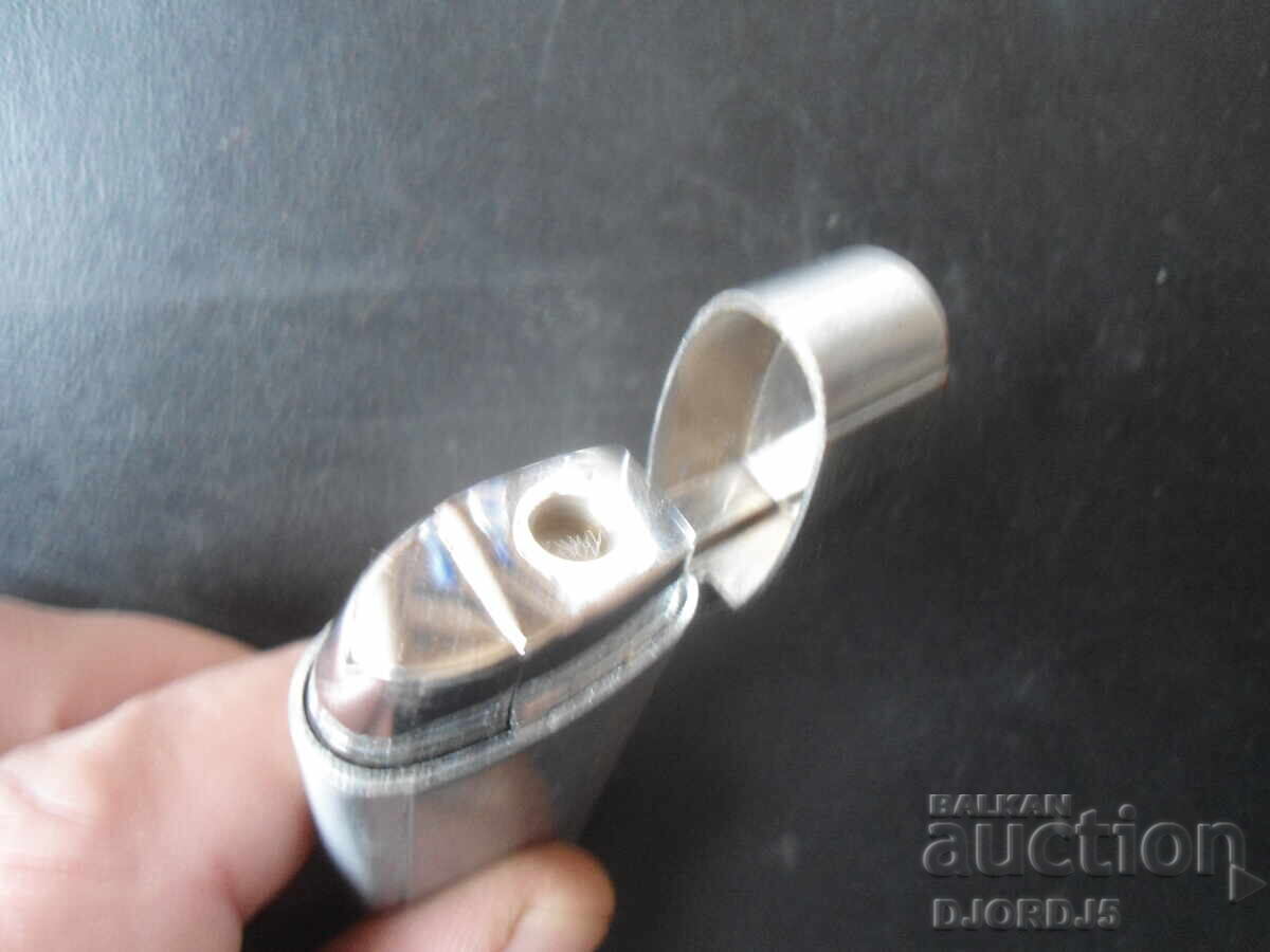 Auction  An old lighter