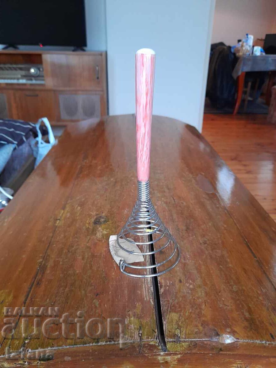 An old egg beater An old egg beater