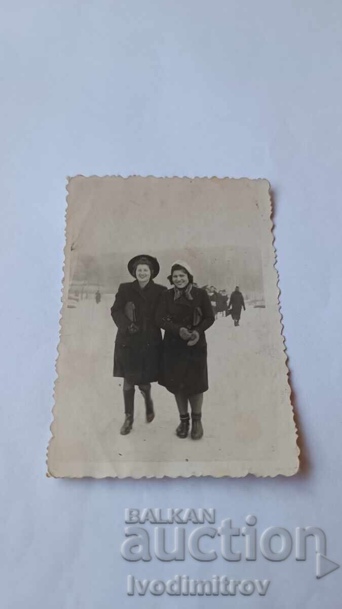 Photo Sofia Two young women in winter coats Photo Sofia Two young women in winter coats