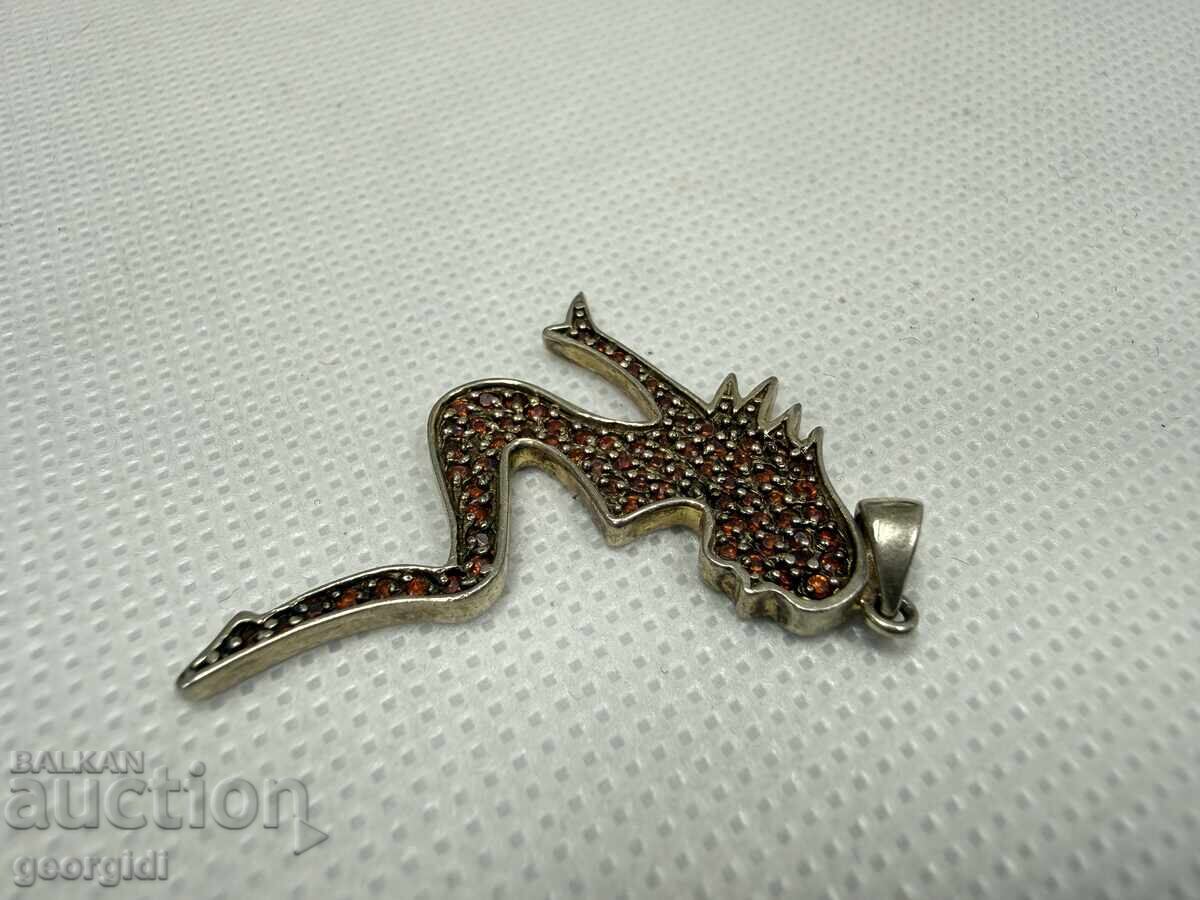 Auction  Silver pendant with a woman's silhouette. No. 7786