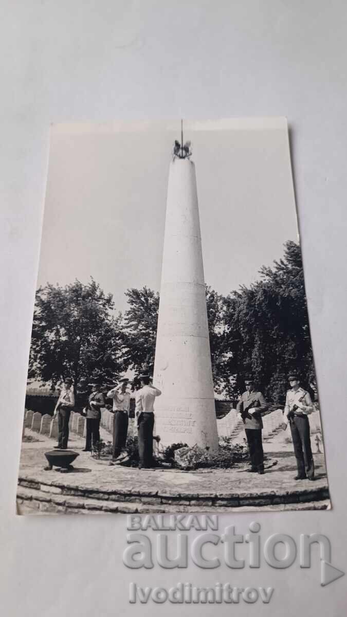 Photo of Soldiers in front of a War Memorial