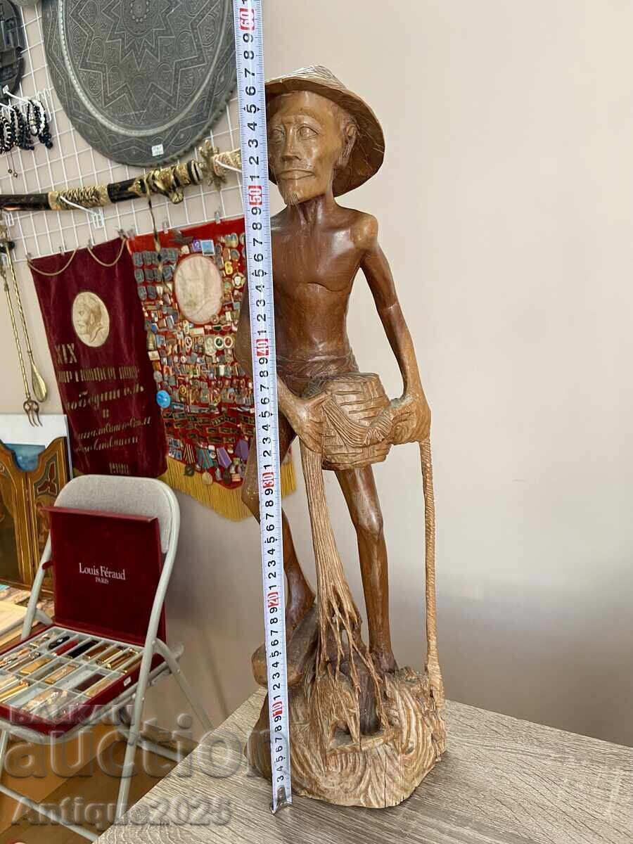 Vintage carved teak wood sculpture — fisherman with net with price € 50.00 | 97.79 BGN