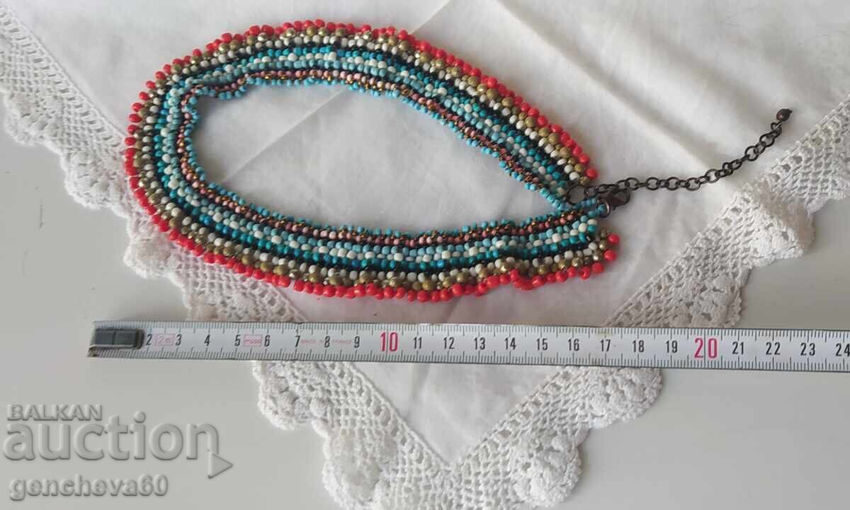 Delivery of Beaded necklace and dance scarf