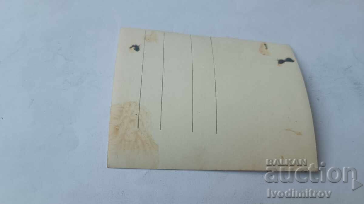 Photo of a Man in Front of an Old Village House with Tile Roof with price € 1.27 | 2.48 BGN