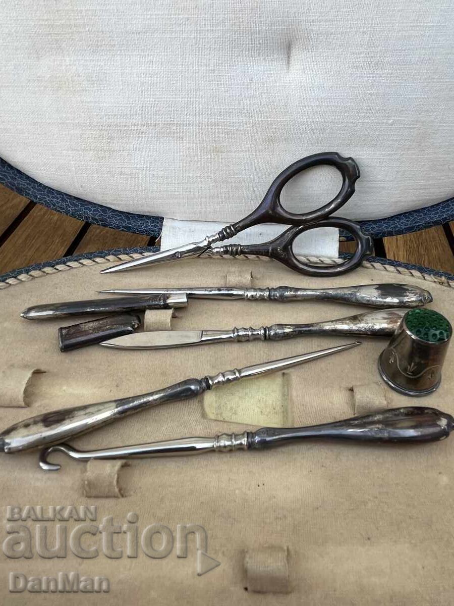 Delivery of Vintage 19th-century silver sewing set, silver, with a hollow