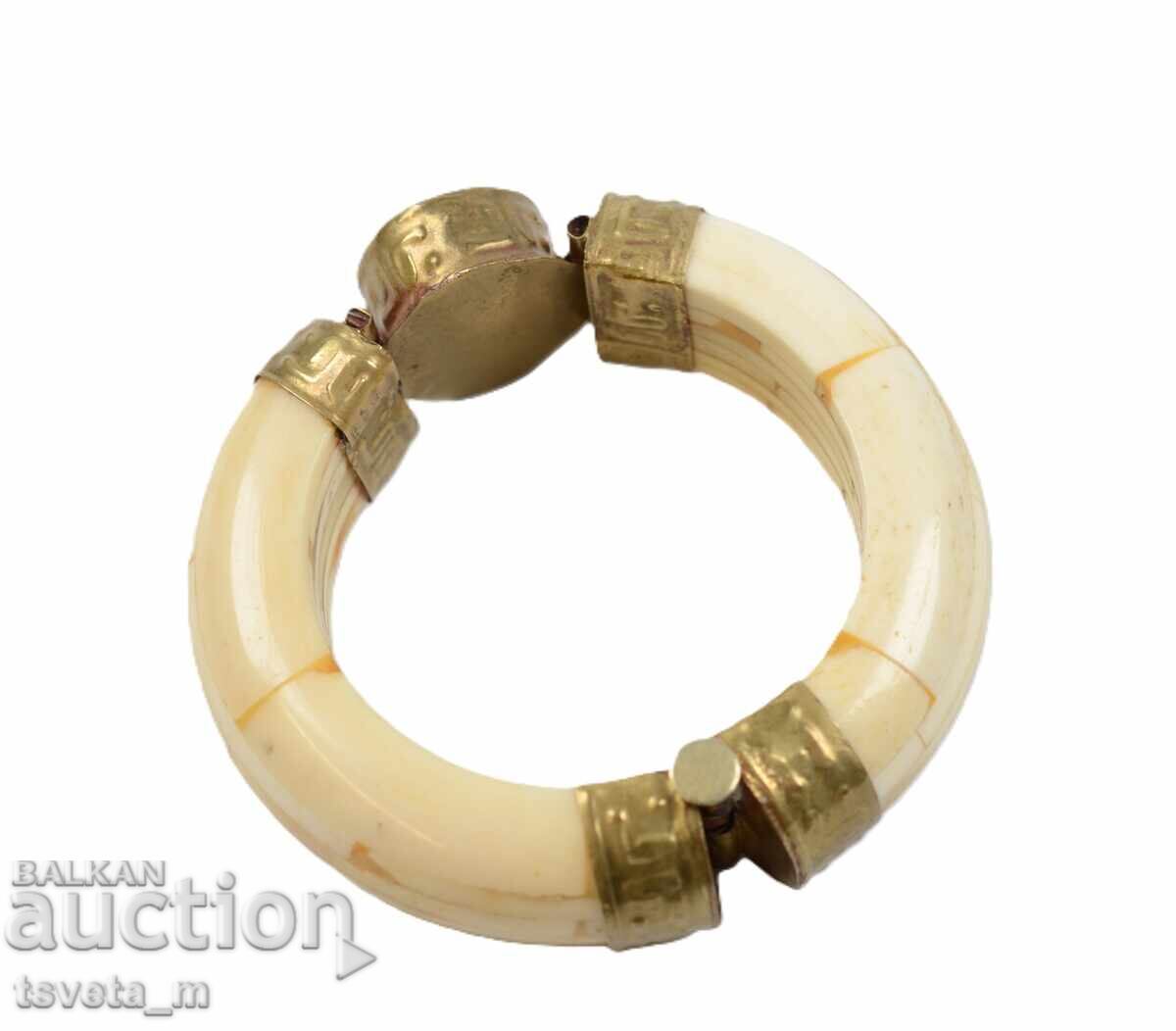 Auction Antique bone bracelet with brass elements and a stone Auction Antique bone bracelet with brass elements and a stone