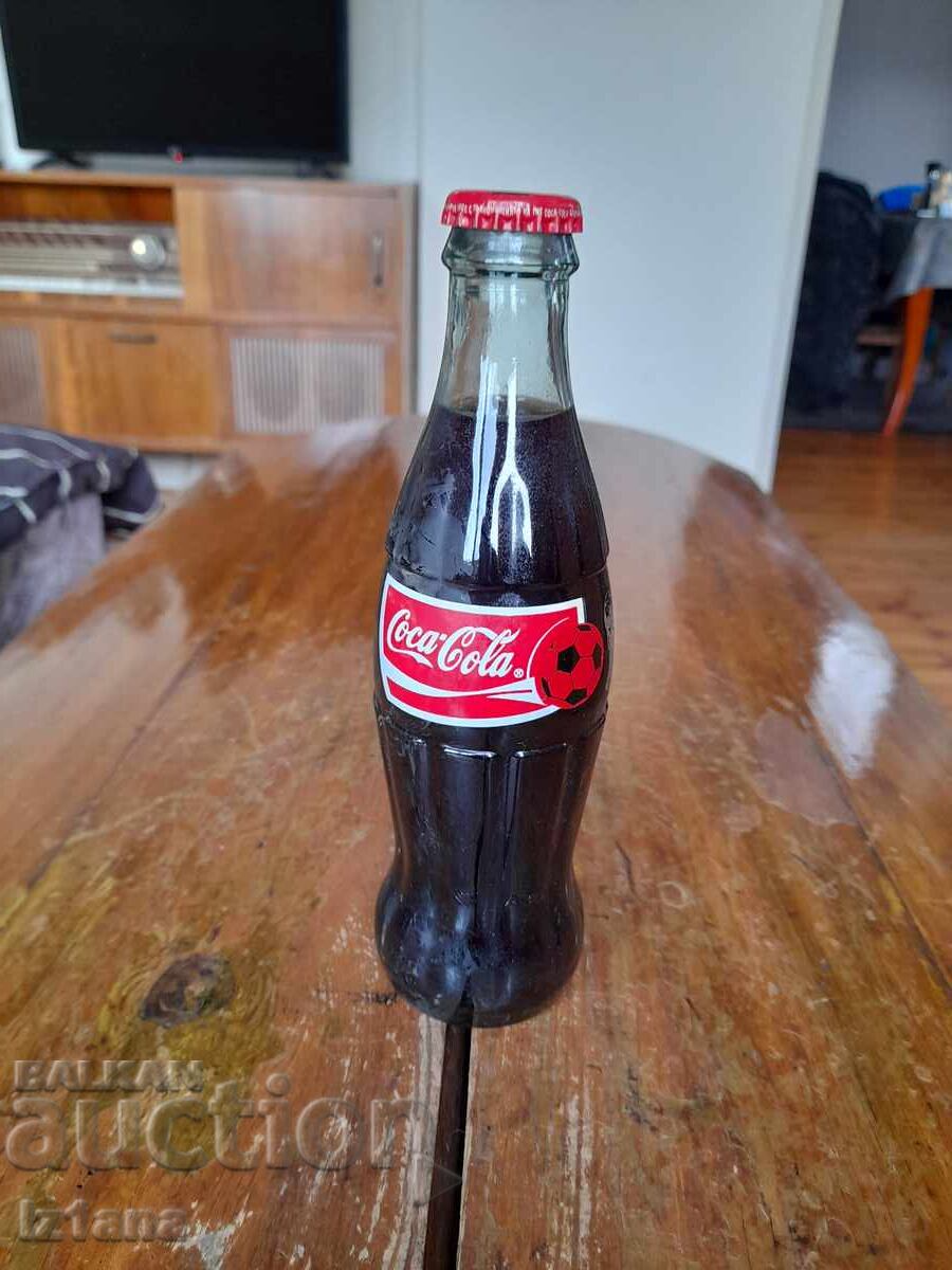 Ένα παλιό μπουκάλι Coca Cola, Coca Cola