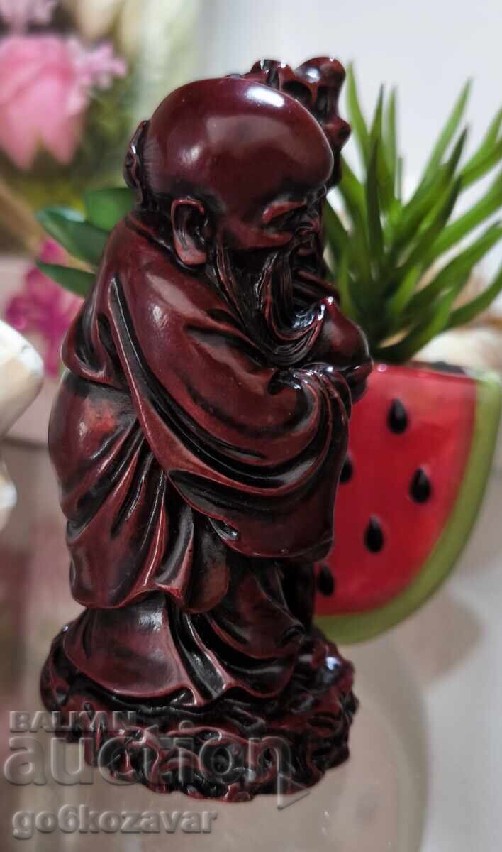 Delivery of Decorative figure Asian sage. Red resin! Delivery of Decorative figure Asian sage. Red resin!