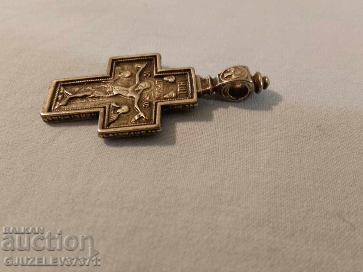Auction  Silver cross with oxidation - light and protection
