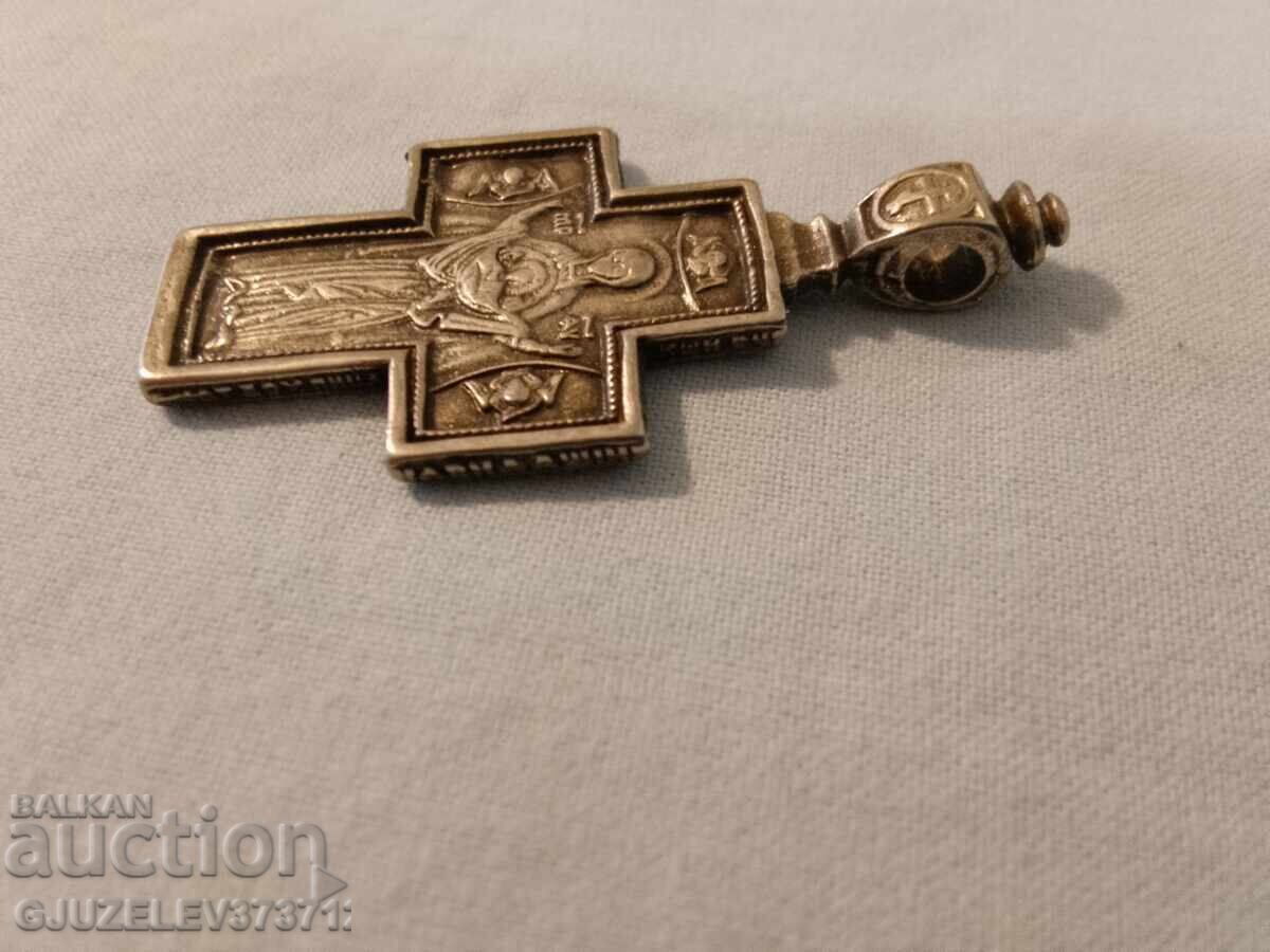 Delivery of Silver cross with oxidation - light and protection