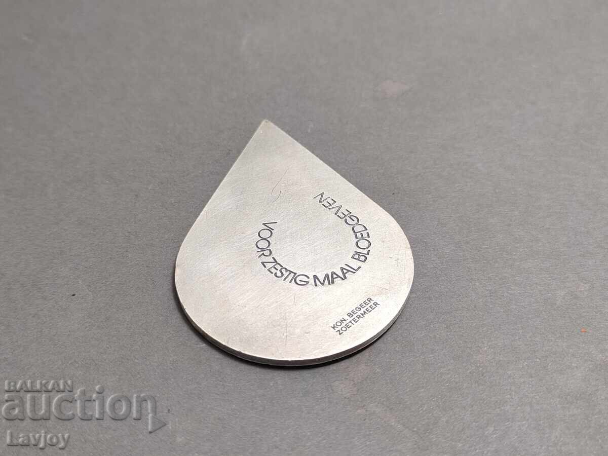 Delivery of Silver-plated blood donor plaque Delivery of Silver-plated blood donor plaque