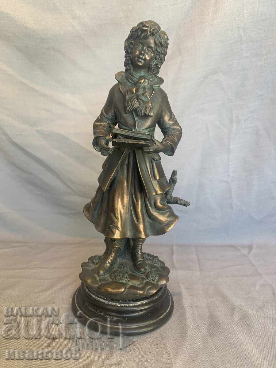 Figure statuette of a student