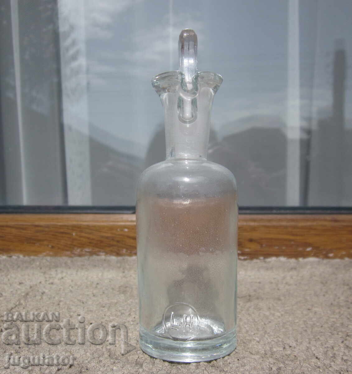 Sticlă farmaceutică germană veche L-H cu preț € 10.00 | 19.56 BGN Sticlă farmaceutică germană veche L-H cu preț € 10.00 | 19.56 BGN