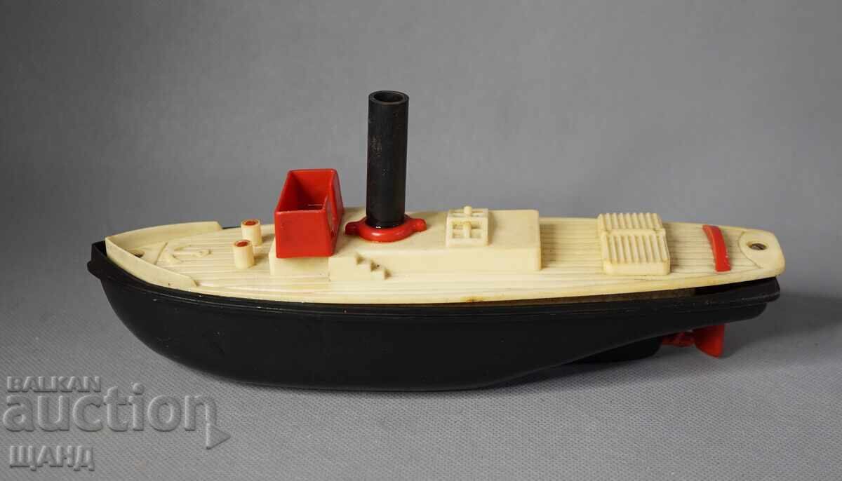 Vechiă jucărie mecanică din plastic germană model navă