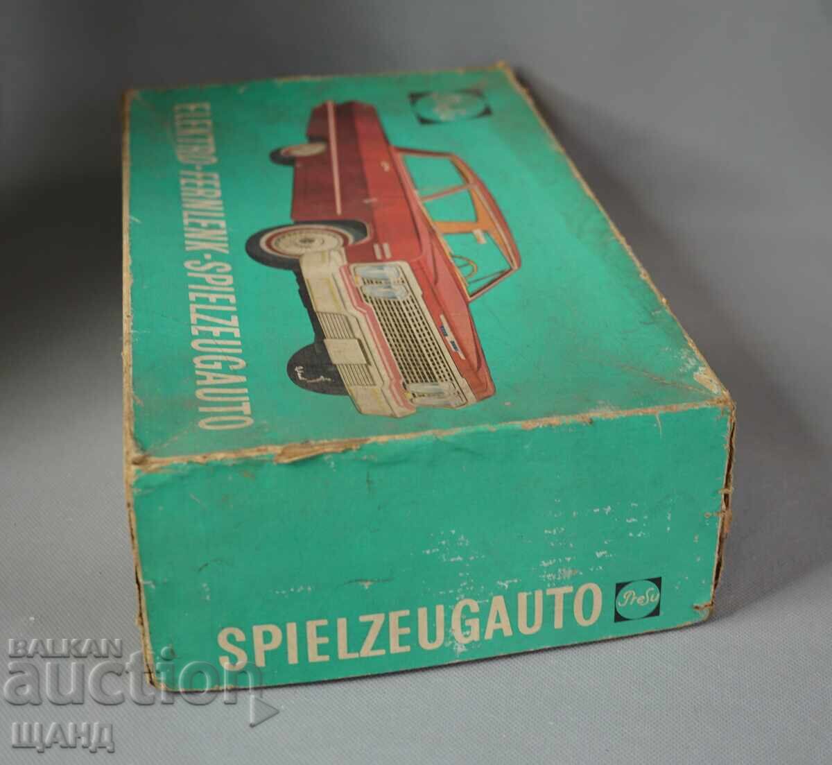 Licitație Cutie veche de carton de la o jucărie germană model mașină