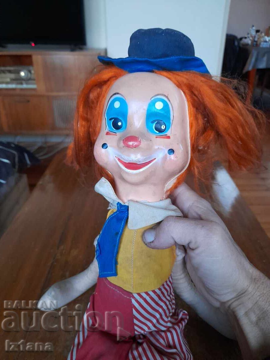 Auction  Old doll, clown