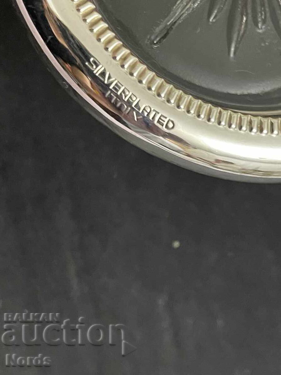 Delivery of Italian wine coaster with silver-plated trim