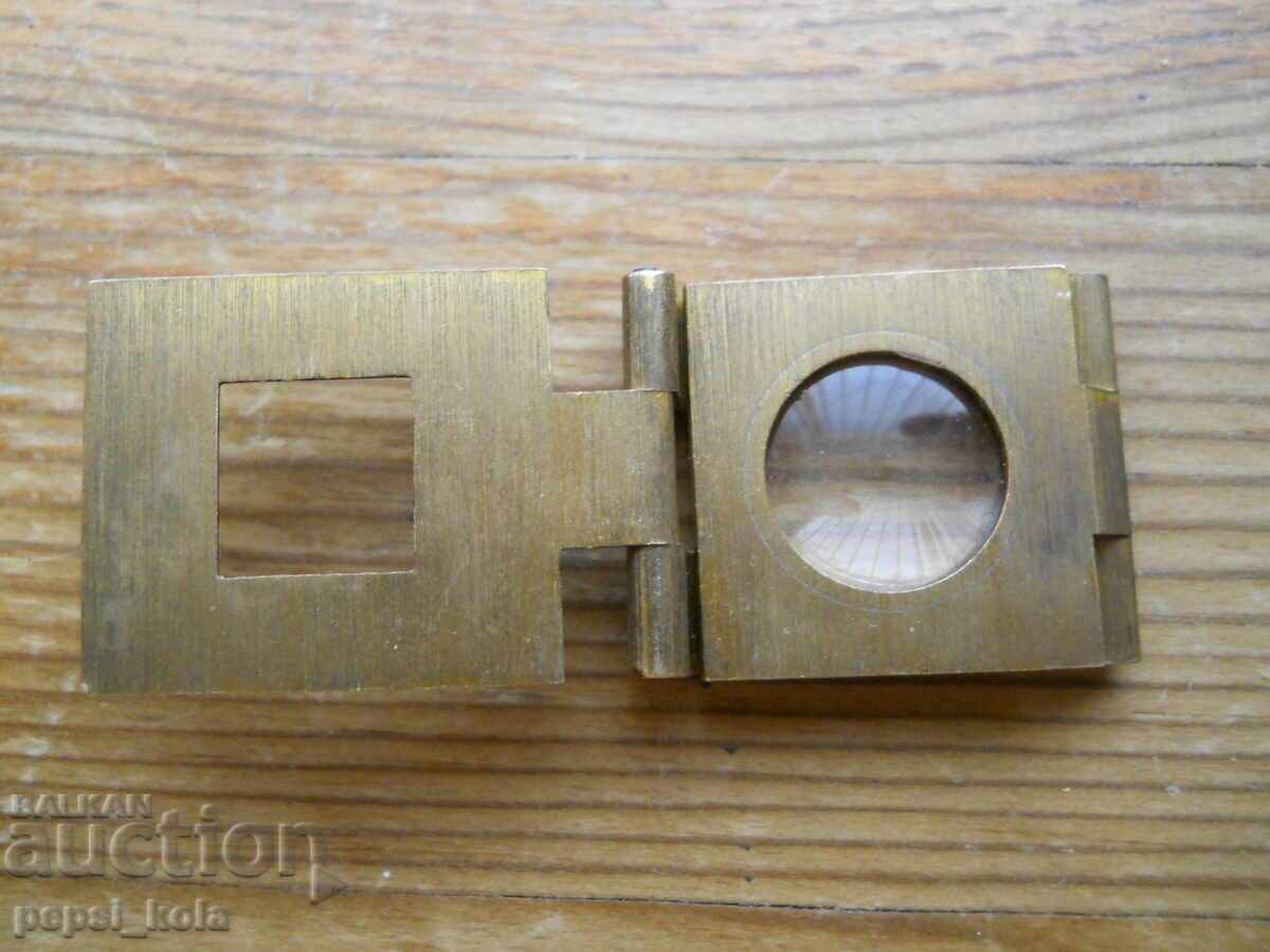 Auction  Antique folding magnifying glass