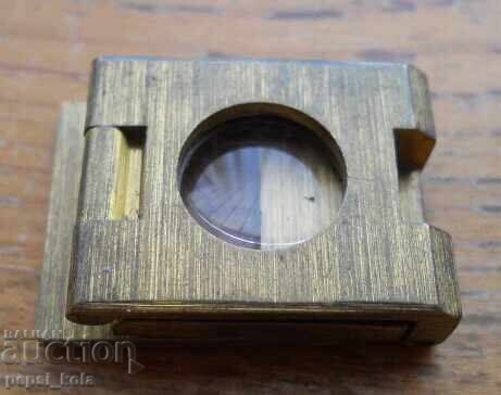 Antique folding magnifying glass
