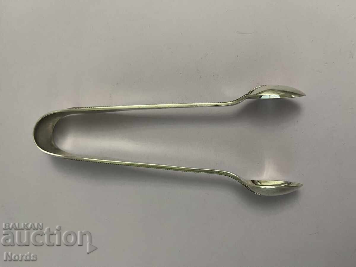 Посребрена щипка за лед с маркировка с цена € 0.01 | 0.02 лв. Посребрена щипка за лед с маркировка с цена € 0.01 | 0.02 лв.